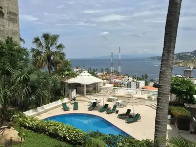 Piscina en o cerca de Villa Palmitas acogedor departamento nivel piscina gigante jardines