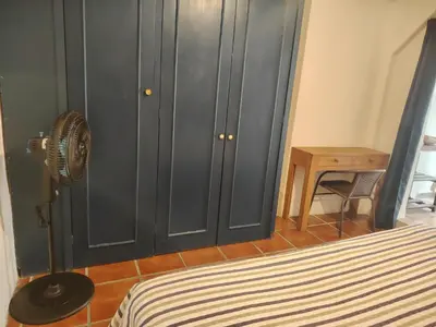 Cama o camas de una habitación en Cuatro Rumbos Hospedaje