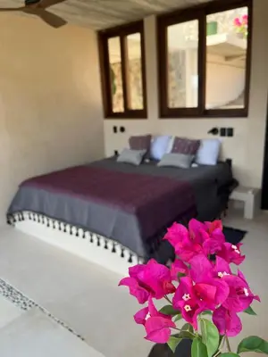 Cama o camas de una habitación en Villa Xololo Luxury Villa, La Boquilla Beach