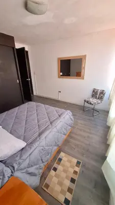 Cama o camas de una habitación en Casa de los abuelos Cholula