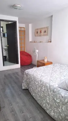 Cama o camas de una habitación en Casa de los abuelos Cholula
