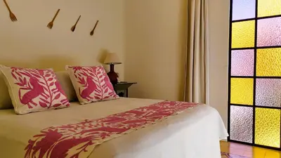 Cama o camas de una habitación en El Diablo y La Luna B&B by El Diablo y La Sandia