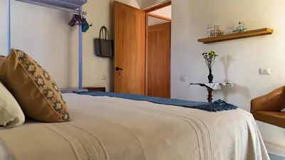 Cama o camas de una habitación en El Diablo y La Luna B&B by El Diablo y La Sandia