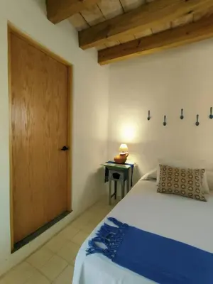 Cama o camas de una habitación en El Diablo y La Luna B&B by El Diablo y La Sandia