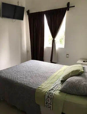 Cama o camas de una habitación en Hotel Entre Amigos Oaxaca Centro