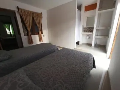 Cama o camas de una habitación en Hotel Entre Amigos Oaxaca Centro