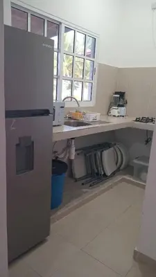 Una cocina o zona de cocina en Villa Cristina en Villas Camino Real cerca de las dunas de Chachalacas