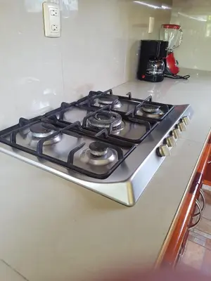 Una cocina o zona de cocina en Villa El Lago en Villas Camino Real cerca de las dunas de Chachalacas