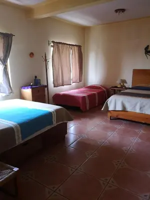 Cama o camas de una habitación en Loft El Rosario