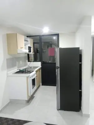 Una cocina o zona de cocina en A solo 10 min de Aeropuerto de la de la CDMX y Estadio GNP Vigilancia 24 horas
