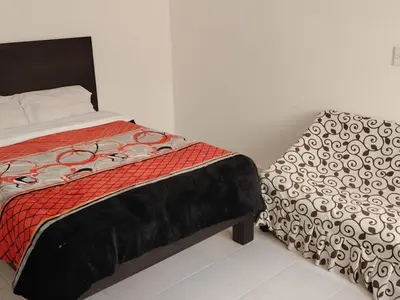 Cama o camas de una habitación en Hotel Los Ajolotes