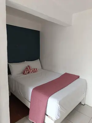 Cama o camas de una habitación en Suite 106 Cordoba, Centro con Estacionamiento