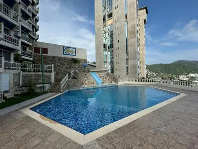Piscina en o cerca de Comodo departamento cerca de Costera Acapulco