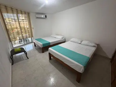 Cama o camas de una habitación en Comodo departamento cerca de Costera Acapulco