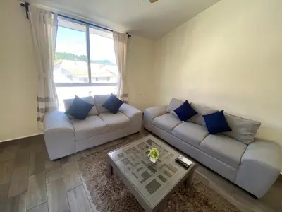 Zona de estar de Newly remodeled apartment in Huatulco