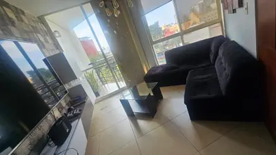 Una televisión o centro de entretenimiento en Depa popo