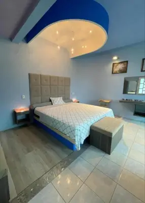 Cama o camas de una habitación en Departamentos paraiso de adan1