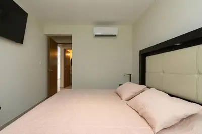 Cama o camas de una habitación en Diamante Residencial