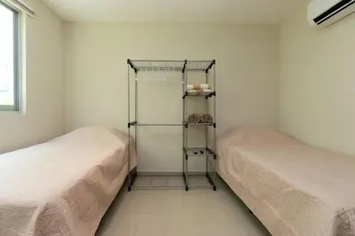 Cama o camas de una habitación en Diamante Residencial