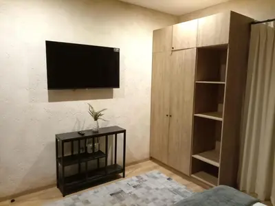 Una televisión o centro de entretenimiento en Loft Dolce Vita