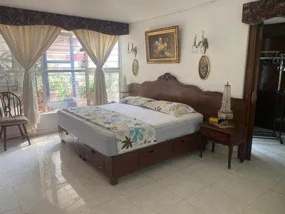 Cama o camas de una habitación en Viveros de Coyoacan