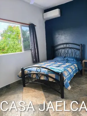 Cama o camas de una habitación en spacious apartment with ocean view
