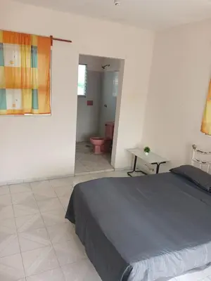 Cama o camas de una habitación en Alojmiento centrico y cerca de la playa