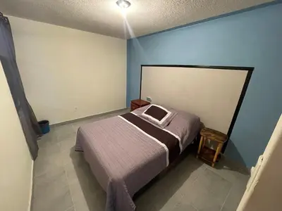 Cama o camas de una habitación en Casa cerca de Plaza de Toros de Apizaco y del Centro Deportivo de Alto Rendimiento