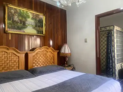 Cama o camas de una habitación en Los viveros de Coyoacan