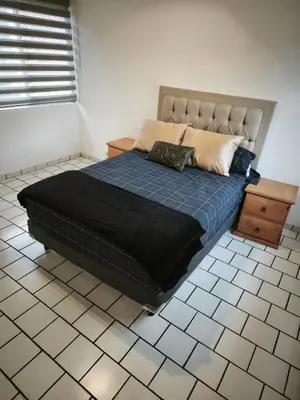 Cama o camas de una habitación en casa agradable