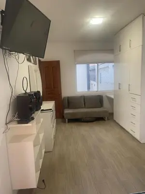 Una televisión o centro de entretenimiento en Lovely Home at Vista Hermosa, Cuernavaca