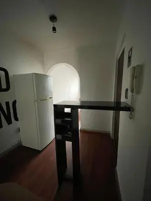 Una cocina o zona de cocina en Departamento comodo y centrico en Portales