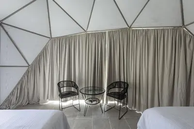 Cama o camas de una habitación en Mar de Barra Glamping