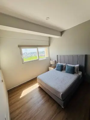 Cama o camas de una habitación en Increíble departamento con vista al mar