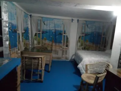 Cama o camas de una habitación en The Blue Apartment