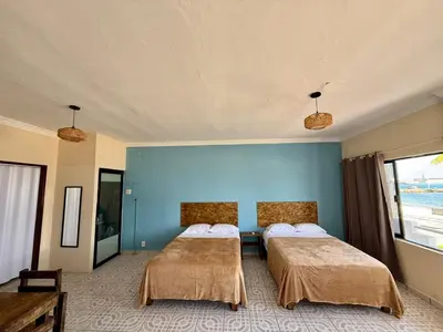 Cama o camas de una habitación en Puerto 201 ROOMS