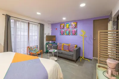 Cama o camas de una habitación en Casa Lila - suite in the heart of Coyoacán