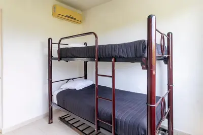 Litera o literas de una habitación en Puerta Laguna E002