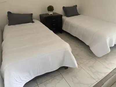 Cama o camas de una habitación en Suite La Lomita #3 Climatizada
