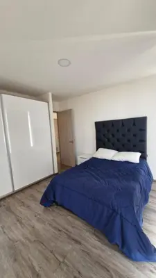 Cama o camas de una habitación en Departamento en Angelópolis