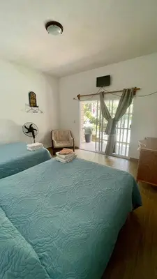 Cama o camas de una habitación en Hospedaje Los Pavo Reales