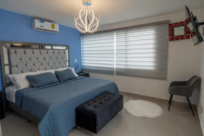Cama o camas de una habitación en Condominio en Acapulco con acceso a club de playa