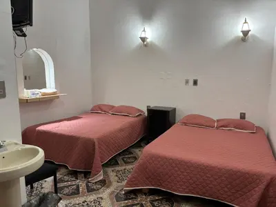 Cama o camas de una habitación en Habitaciones Climar
