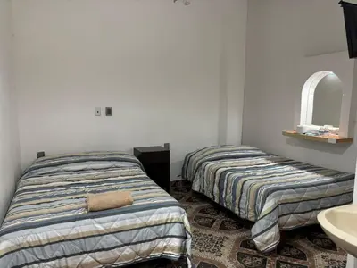 Cama o camas de una habitación en Habitaciones Climar