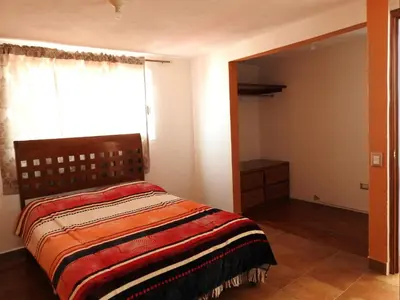 Cama o camas de una habitación en MJ Habitaciones Cholula