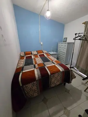 Cama o camas de una habitación en YUCATAN44 Alojamiento para el mundial