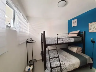 Cama o camas de una habitación en Aeropuerto CDMX 10 min GNP Estadio