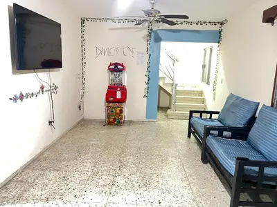 Una televisión o centro de entretenimiento en Casona el Sol