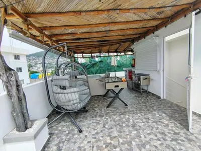 Un patio o zona al aire libre en Villa Yolanda