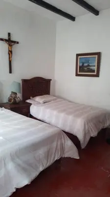 Cama o camas de una habitación en Departamento en Taxco 2 Habitaciones 5 huespedes Estacionamiento Gratis